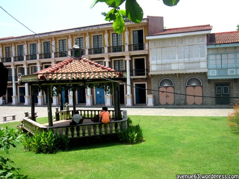 a brick-roofed shed typical of Philippine plazas